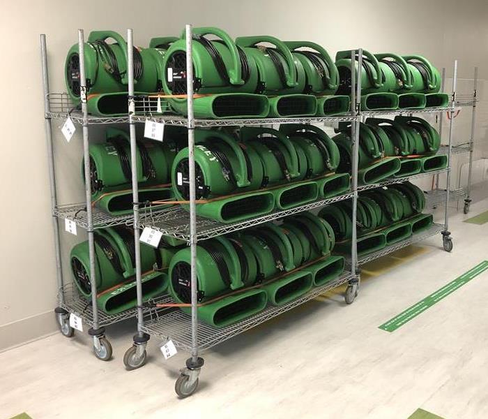 A wall of air movers is ready and waiting for use.
